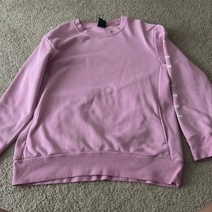 Pink Nike crewneck.